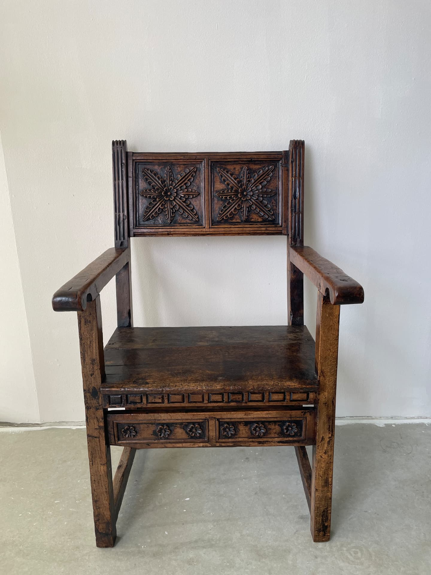 Rare Spanish Renaissance Walnut Armchair (Sillón de Cadera / Frailero) with Carved Floral Star Panels — 16th Century